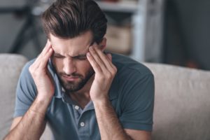man-with-headache-pain