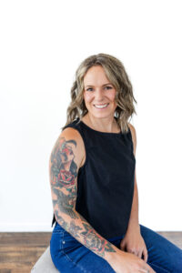 Headshot of LMT jenna rich smiling at the camera.