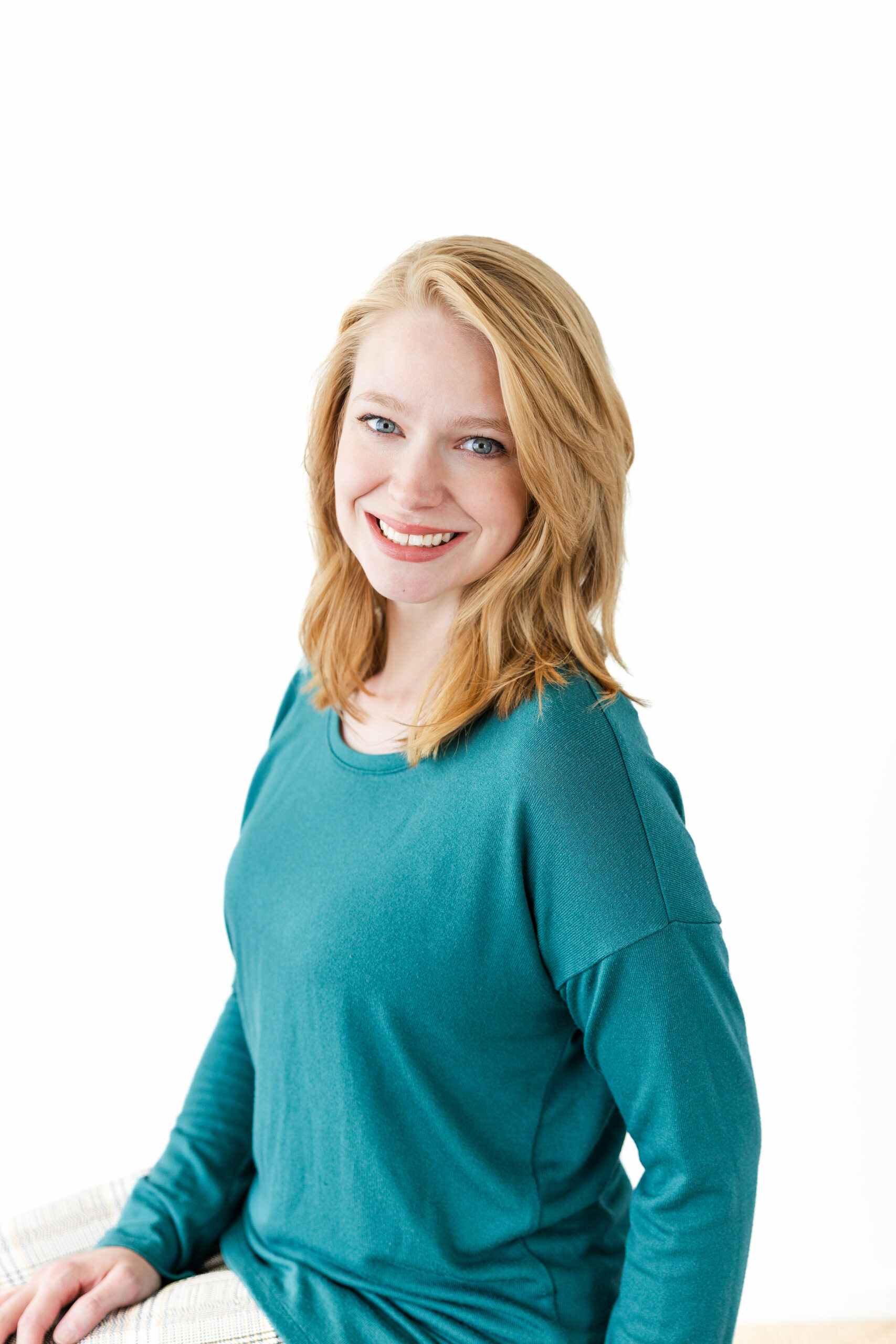 Martika smiling at the camera for chiropractic serviced bend oregon.